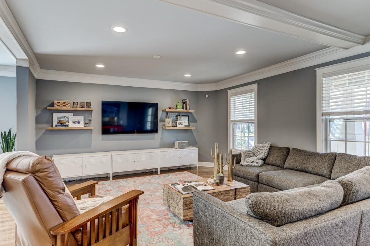 815 Lischey Avenue Nashville, TN 37207 - Photo 5 of 34 a living room with furniture and a flat screen tv