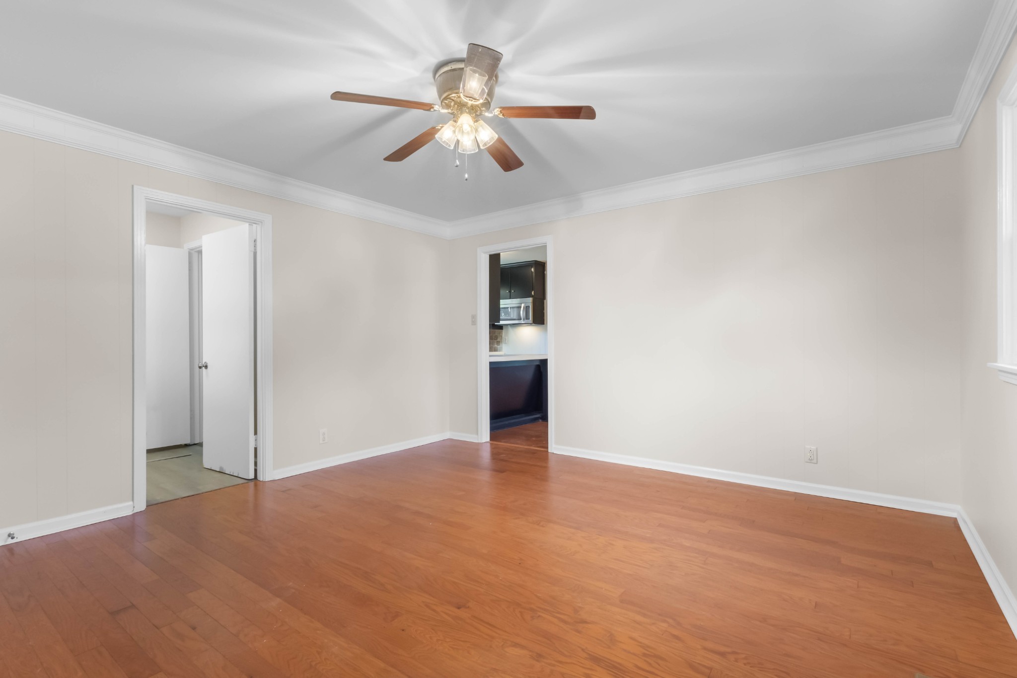 3070 Dover Road Woodlawn, TN 37191 - Photo 14 of 32 a view of an empty room with a chandelier fan