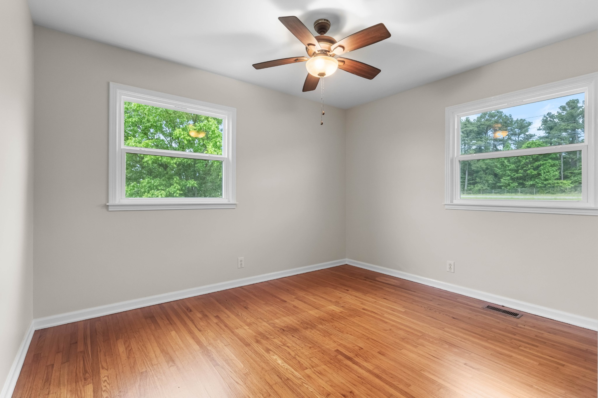 3070 Dover Road Woodlawn, TN 37191 - Photo 16 of 32 a view of empty room with wooden floor