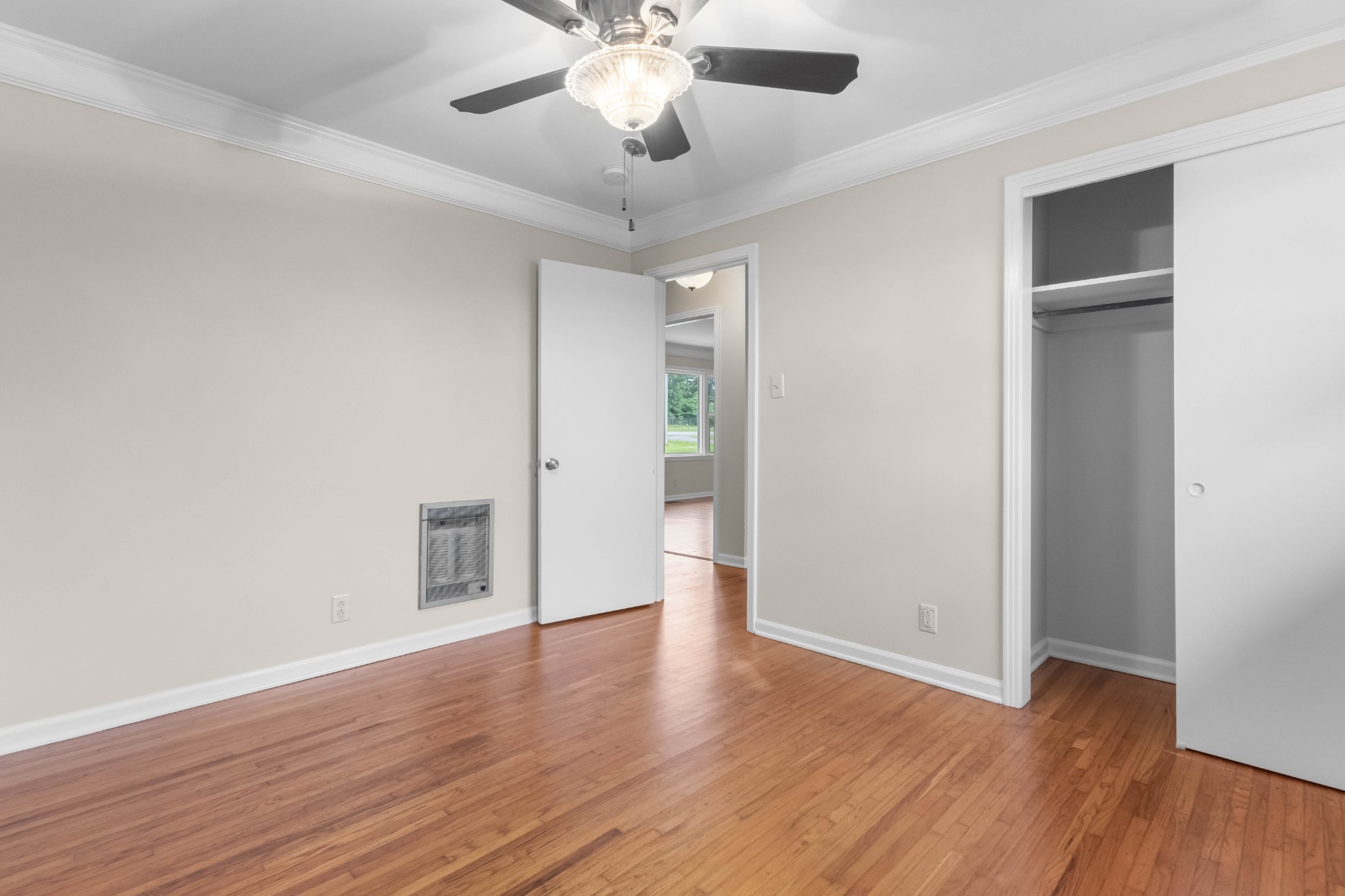 3070 Dover Road Woodlawn, TN 37191 - Photo 19 of 32 a view of an empty room with wooden floor