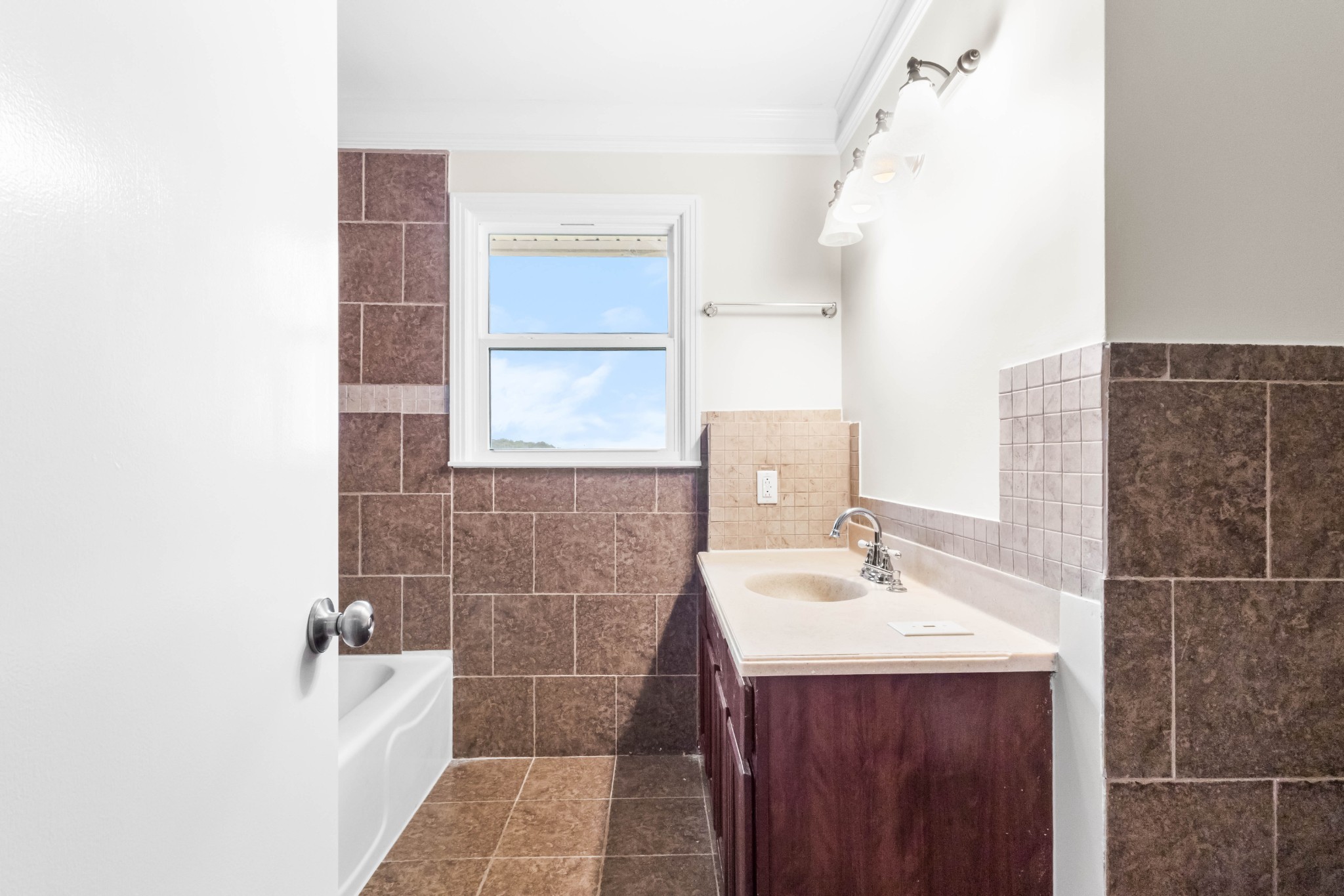3070 Dover Road Woodlawn, TN 37191 - Photo 20 of 32 a bathroom with a sink and a mirror