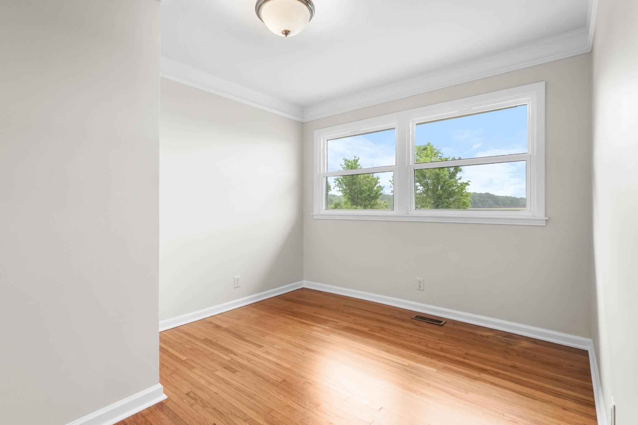 3070 Dover Road Woodlawn, TN 37191 - Photo 21 of 32 an empty room with a window