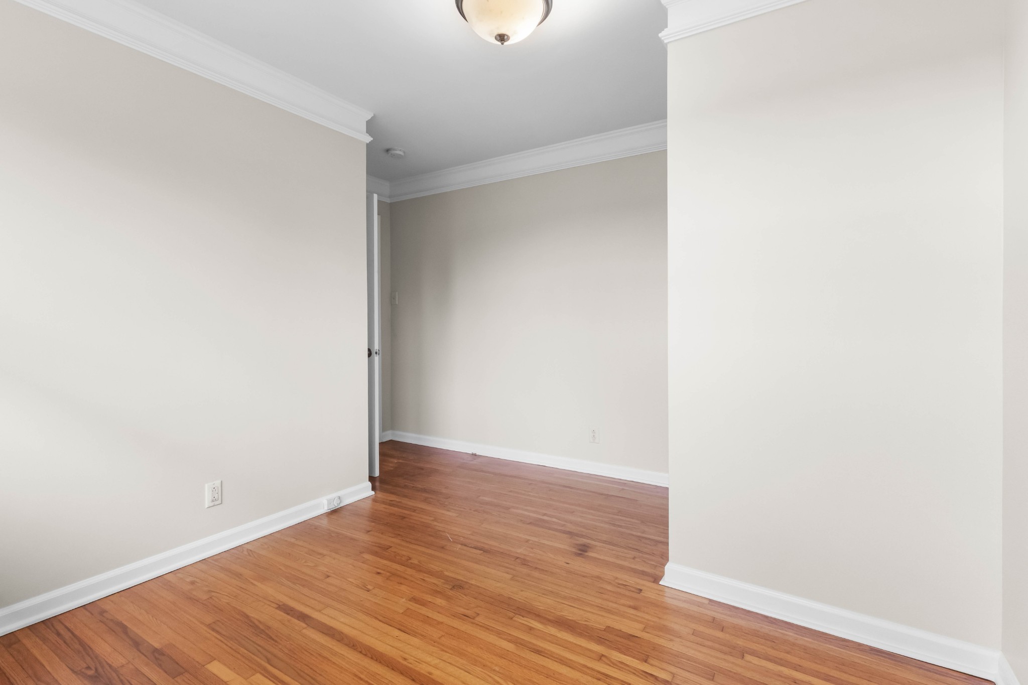 3070 Dover Road Woodlawn, TN 37191 - Photo 22 of 32 a view of an empty room with wooden floor