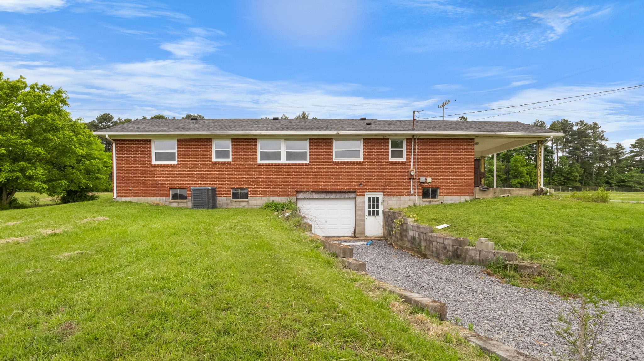 3070 Dover Road Woodlawn, TN 37191 - Photo 28 of 32 a front view of house with yard and green space