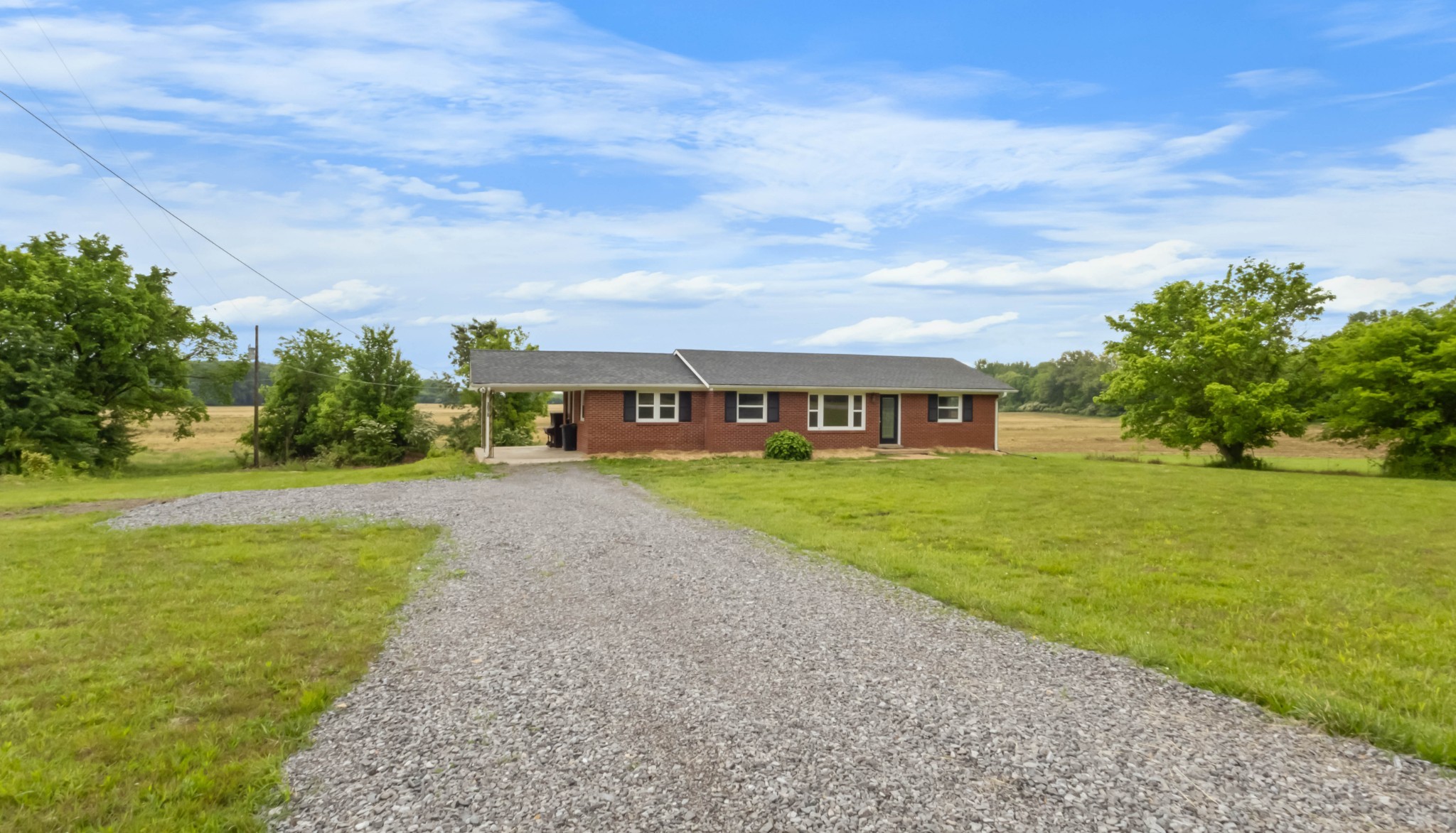 3070 Dover Road Woodlawn, TN 37191 - Photo 3 of 32 a front view of house with yard and green space