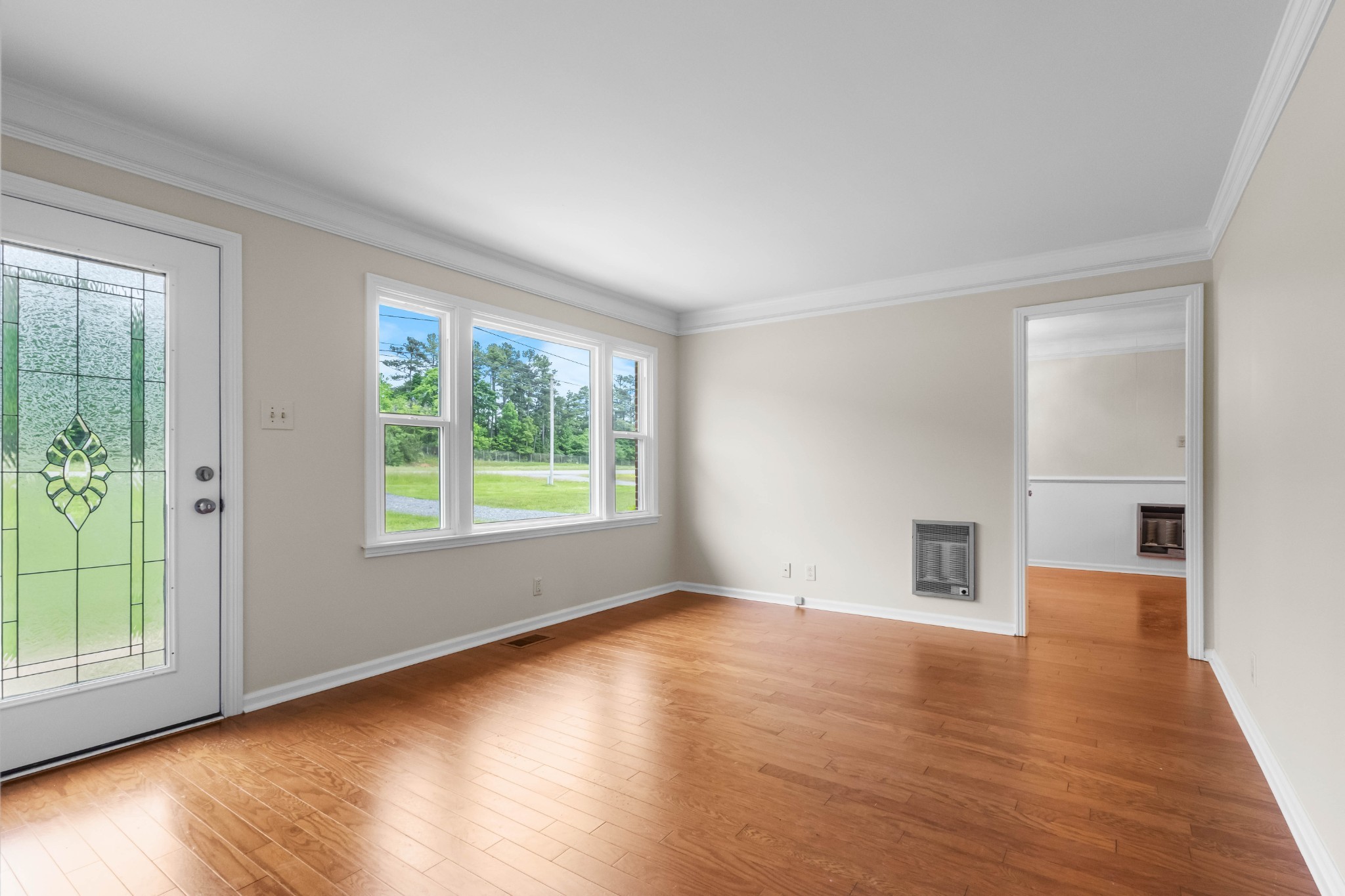 3070 Dover Road Woodlawn, TN 37191 - Photo 6 of 32 a view of empty room with wooden floor and fan
