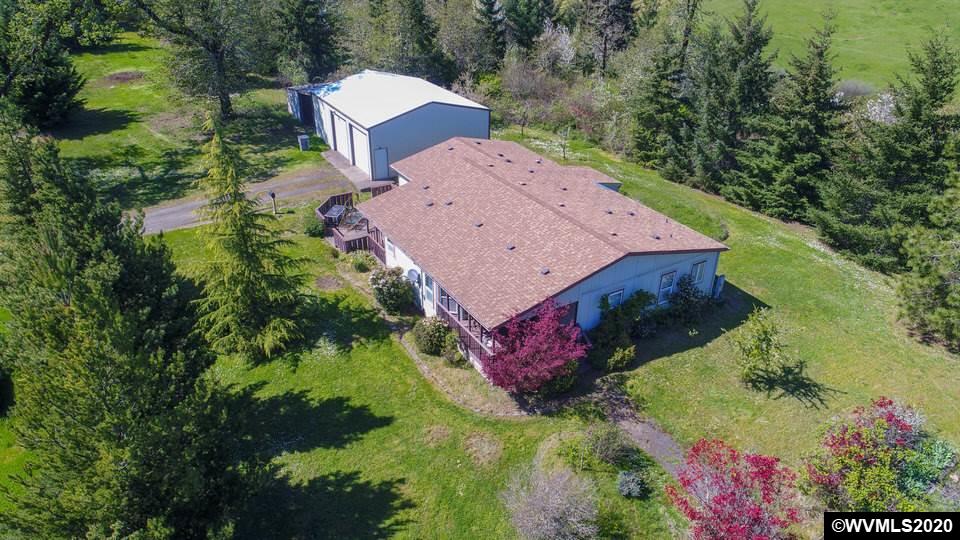 17265 Butler Hill Road Dallas, OR 97338 - Photo 8 of 38 an aerial view of a house