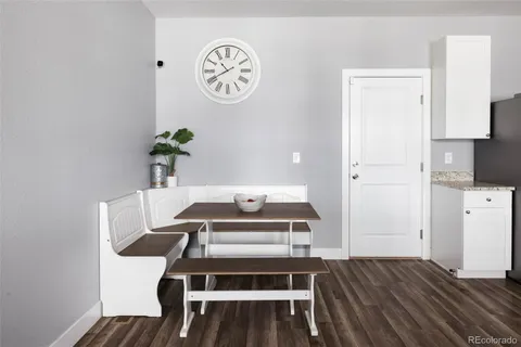 a view of kitchen and wooden floor