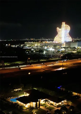 a view of balcony and yard