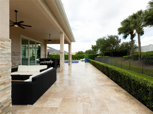 a view of park with large trees