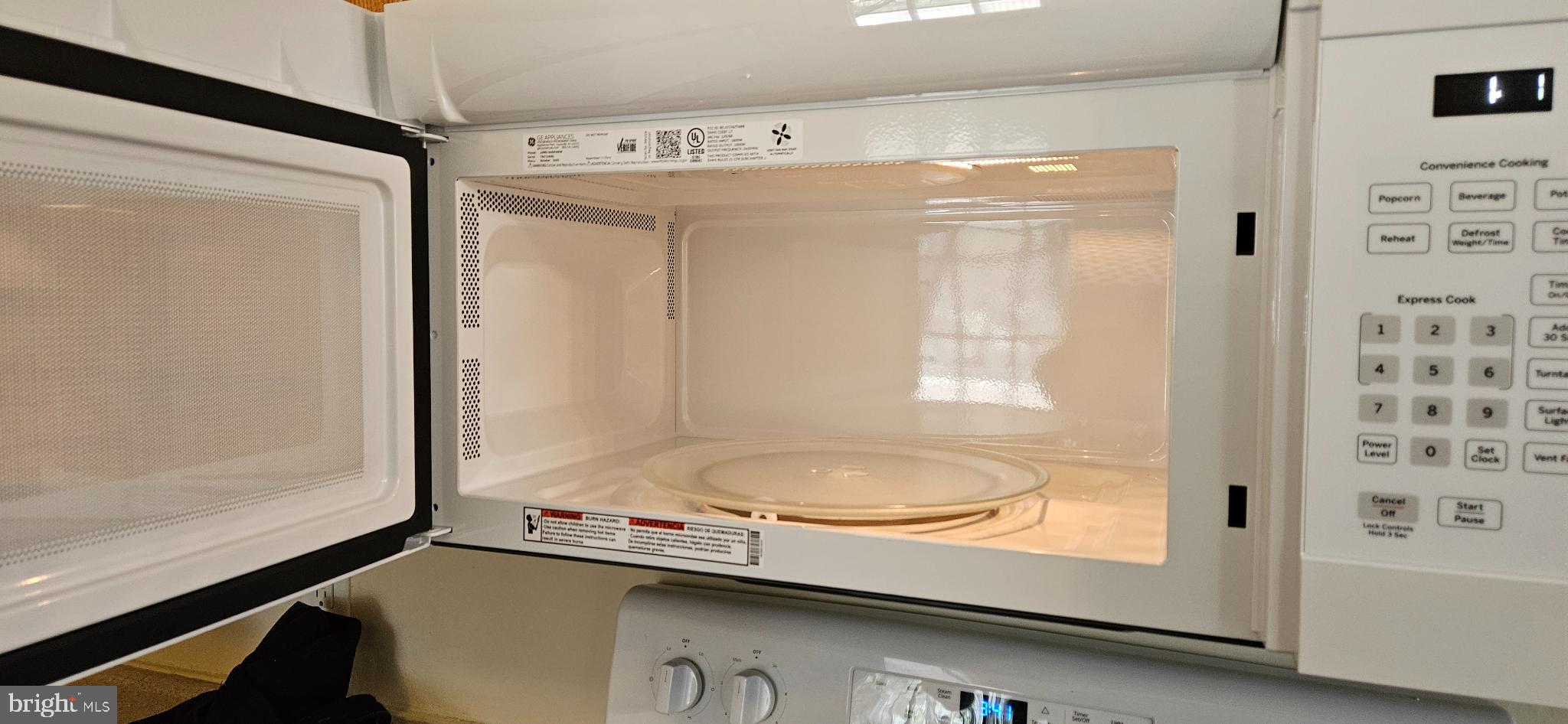 423 Happy Creek Road Front Royal, VA 22630 - Photo 13 of 48 a bathroom with a granite countertop sink a mirror and a bathtub