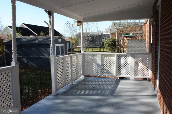 a view of a balcony with door