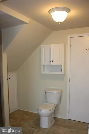 a bathroom with a toilet