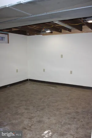 a view of a room with an empty space