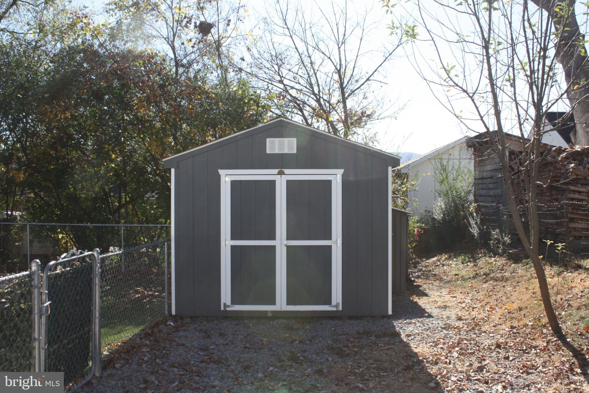 423 Happy Creek Road Front Royal, VA 22630 - Photo 46 of 48 a front view of a house with a yard