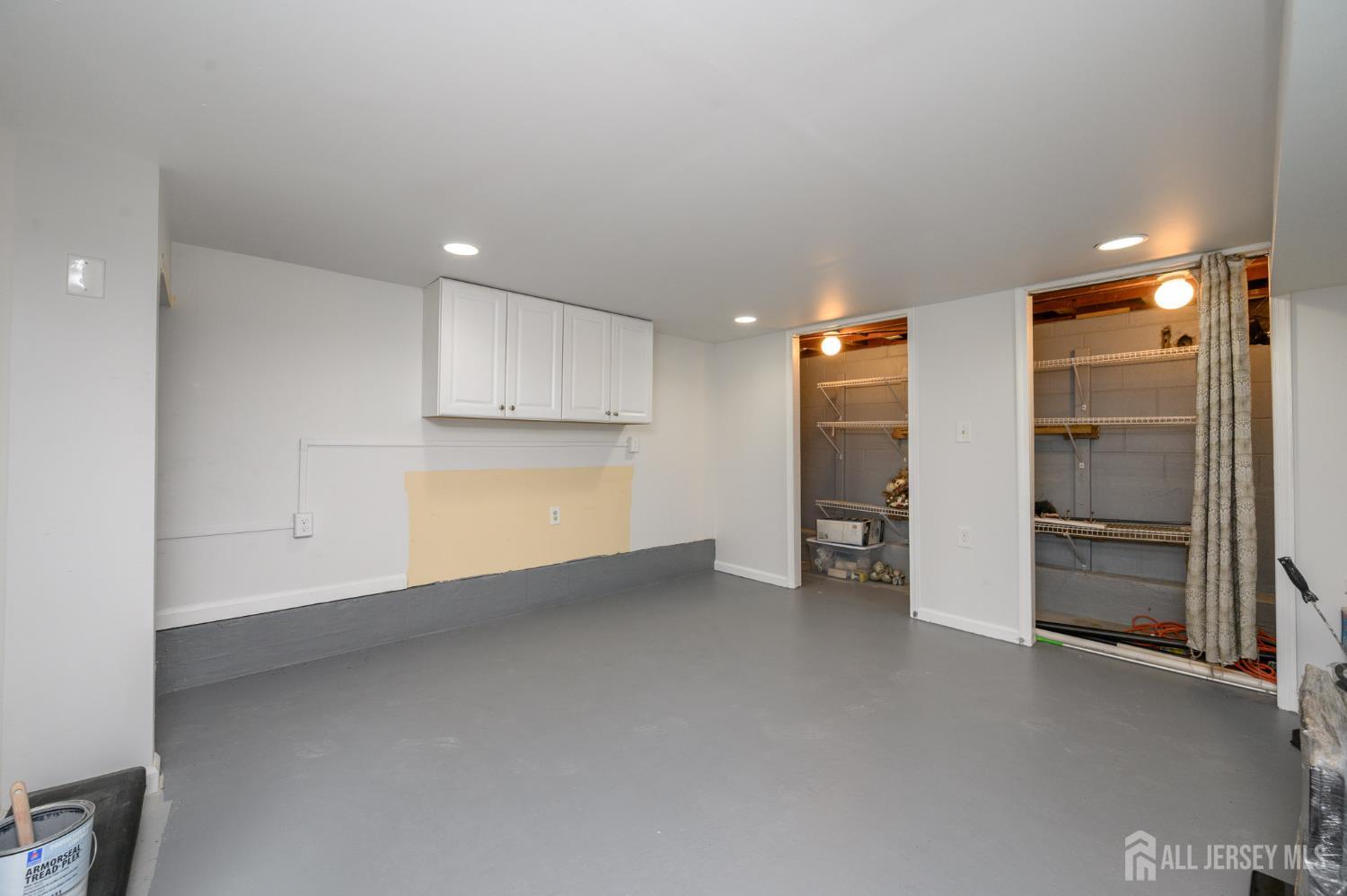 384 Cook Road Jackson, NJ 08527 - Photo 22 of 31 a view of empty room with kitchen and window