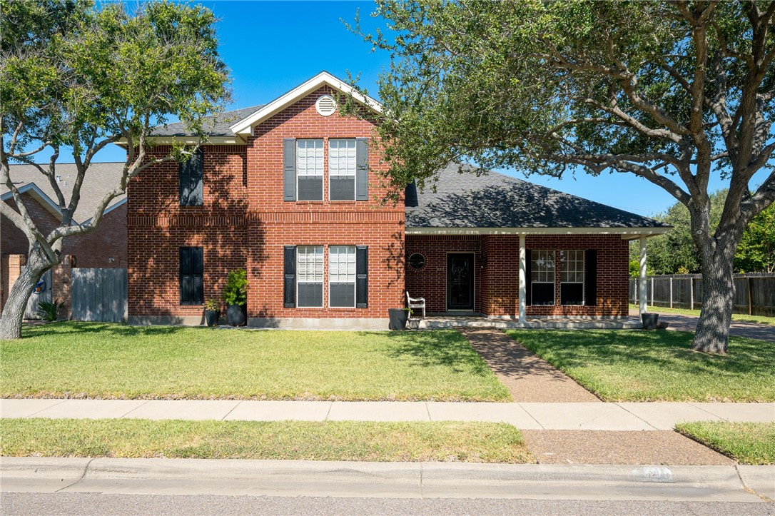 620 Colonial Drive Portland, TX 78374 - Photo 1 of 40 a front view of a house with a yard