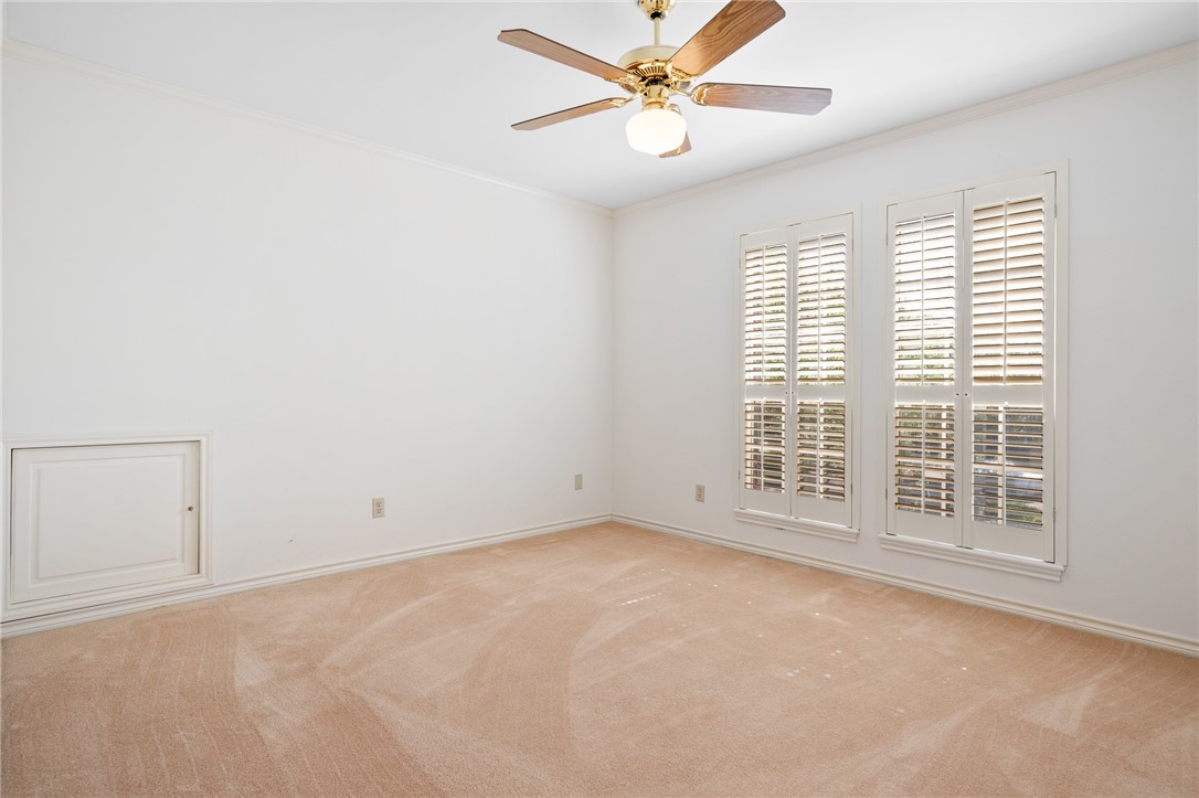 620 Colonial Drive Portland, TX 78374 - Photo 23 of 40 an empty room with windows and fan
