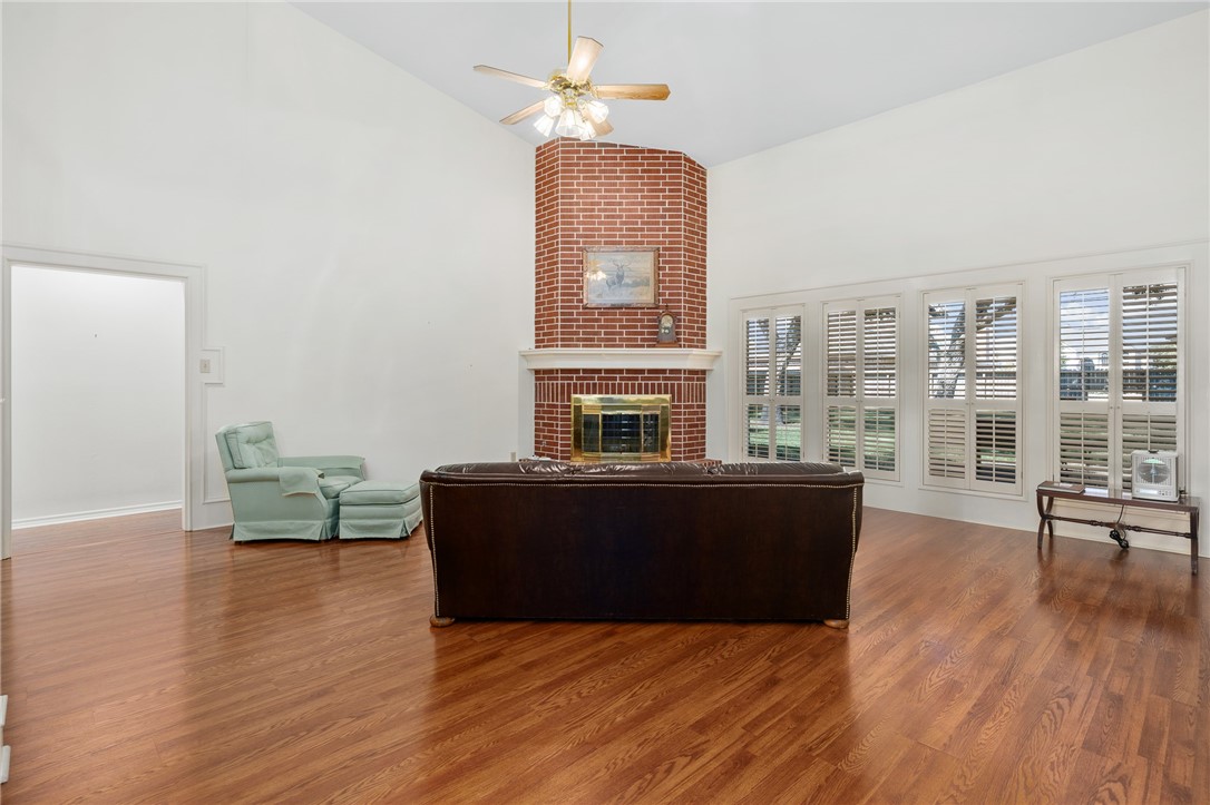 620 Colonial Drive Portland, TX 78374 - Photo 5 of 40 a living room with furniture and a fireplace
