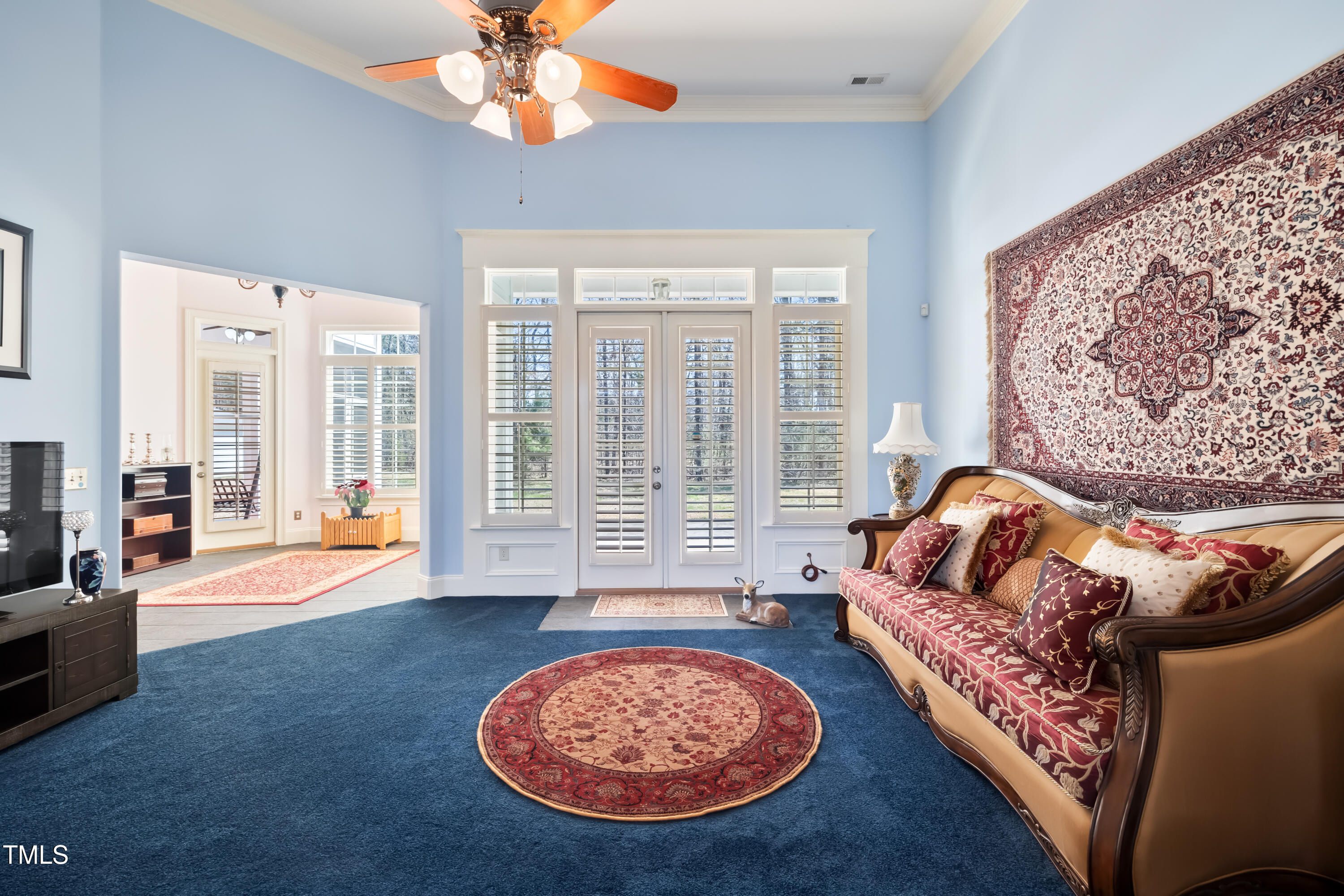 119 Cardinal Crest Pittsboro, NC 27312 - Photo 23 of 70 a living room with furniture a rug and a chandelier