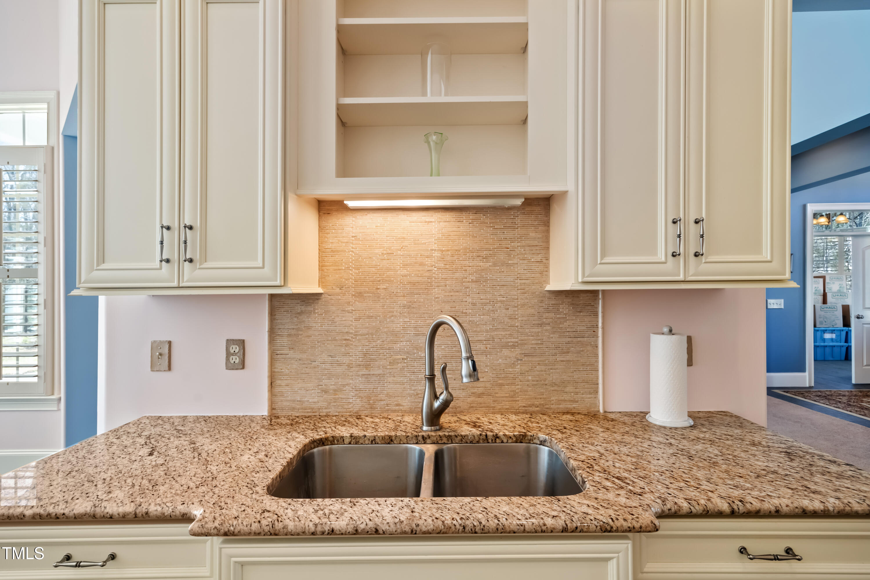 119 Cardinal Crest Pittsboro, NC 27312 - Photo 28 of 70 a kitchen with granite countertop white cabinets and a sink