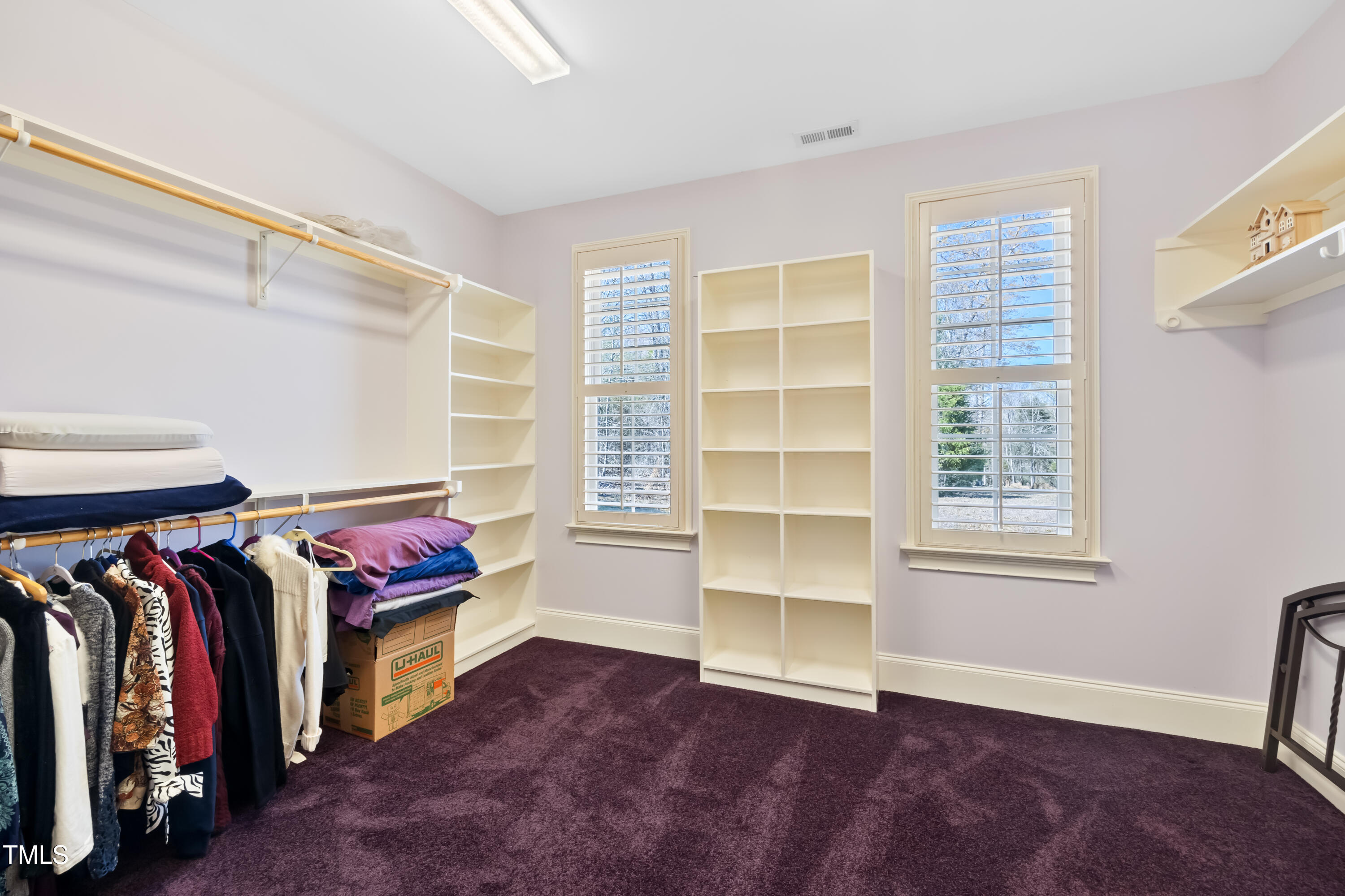 119 Cardinal Crest Pittsboro, NC 27312 - Photo 44 of 70 a view of walk in closet with clothes and shoes