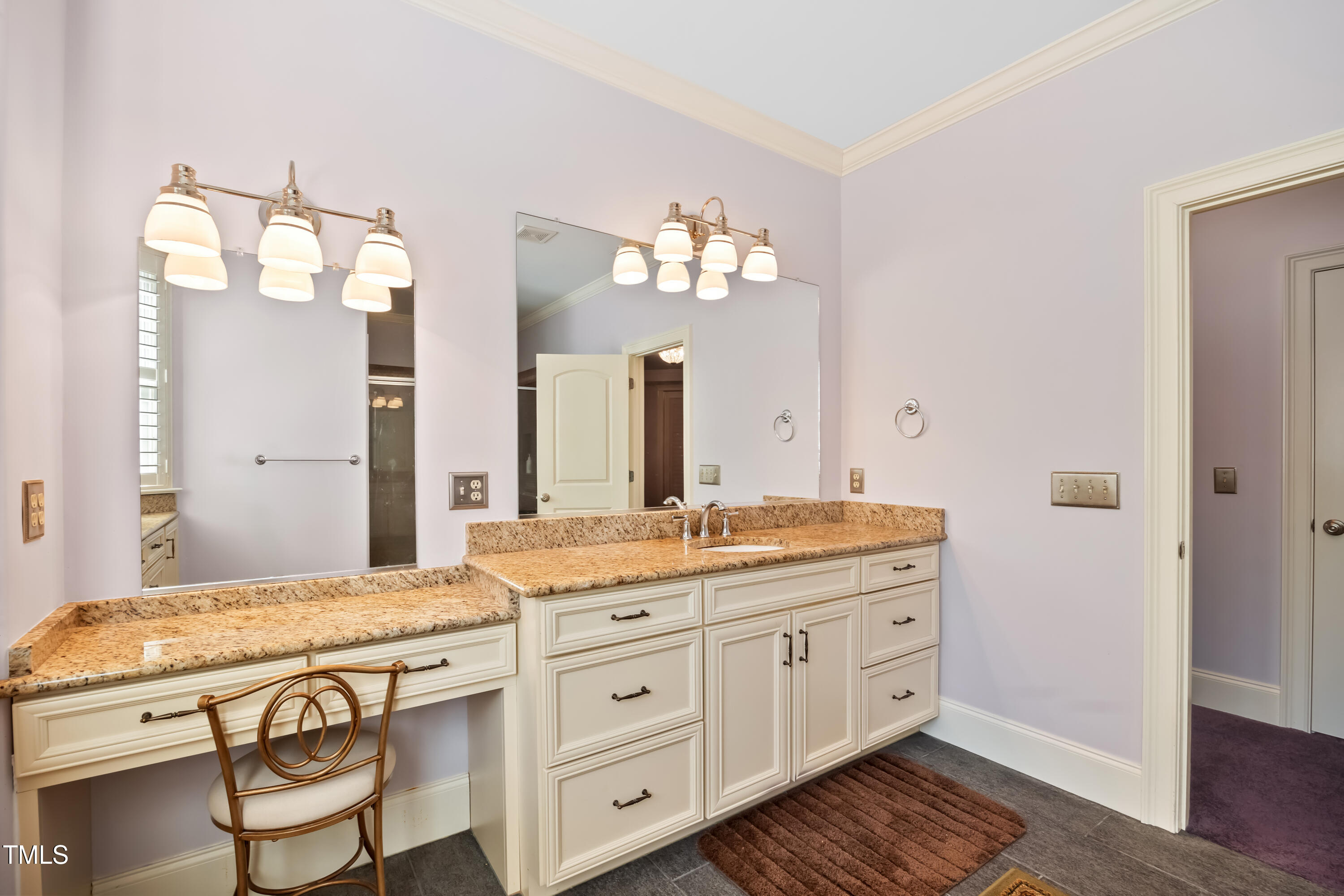 119 Cardinal Crest Pittsboro, NC 27312 - Photo 47 of 70 a spacious bathroom with a granite countertop double vanity sink and a mirror