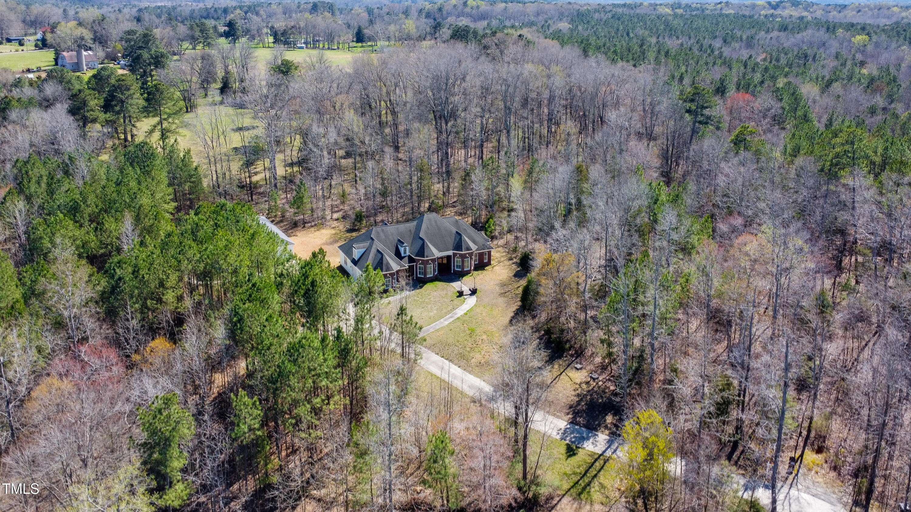119 Cardinal Crest Pittsboro, NC 27312 - Photo 8 of 70 a view of a house with a lush green forest