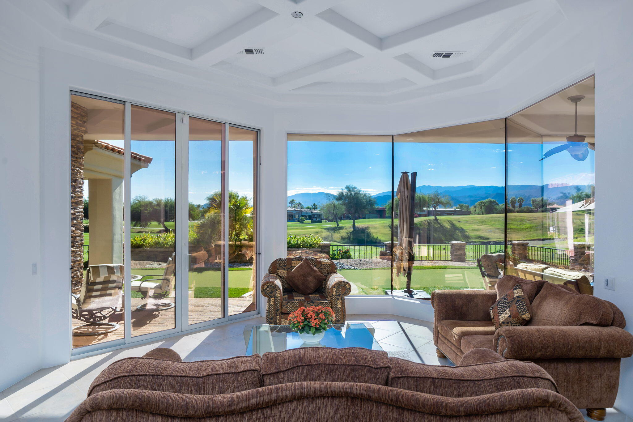 290 Loch Lomond Road Rancho Mirage, CA 92270 - Photo 12 of 50 a living room with furniture and a large window