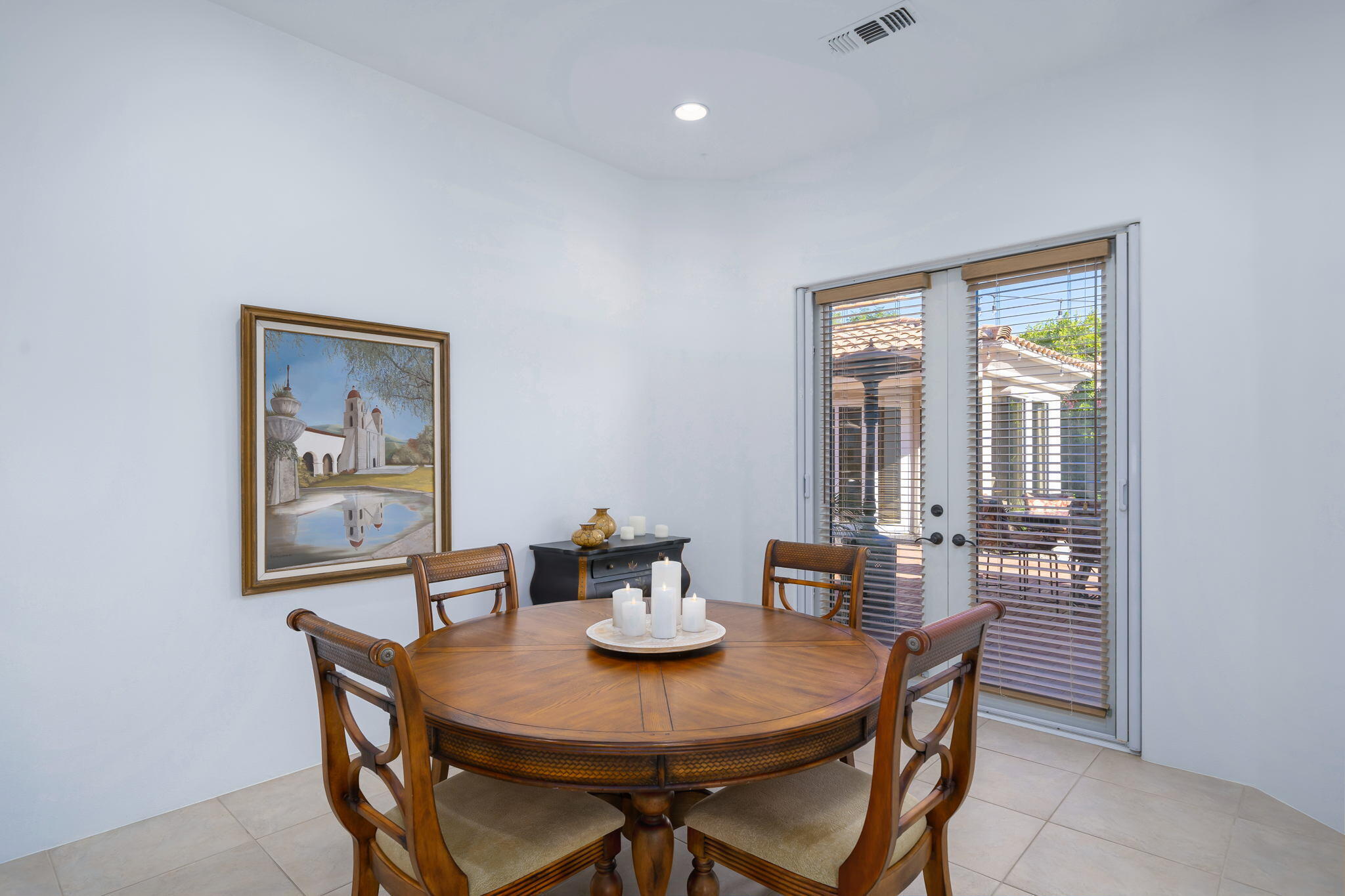 290 Loch Lomond Road Rancho Mirage, CA 92270 - Photo 20 of 50 a view of a dining room with furniture window and outside view