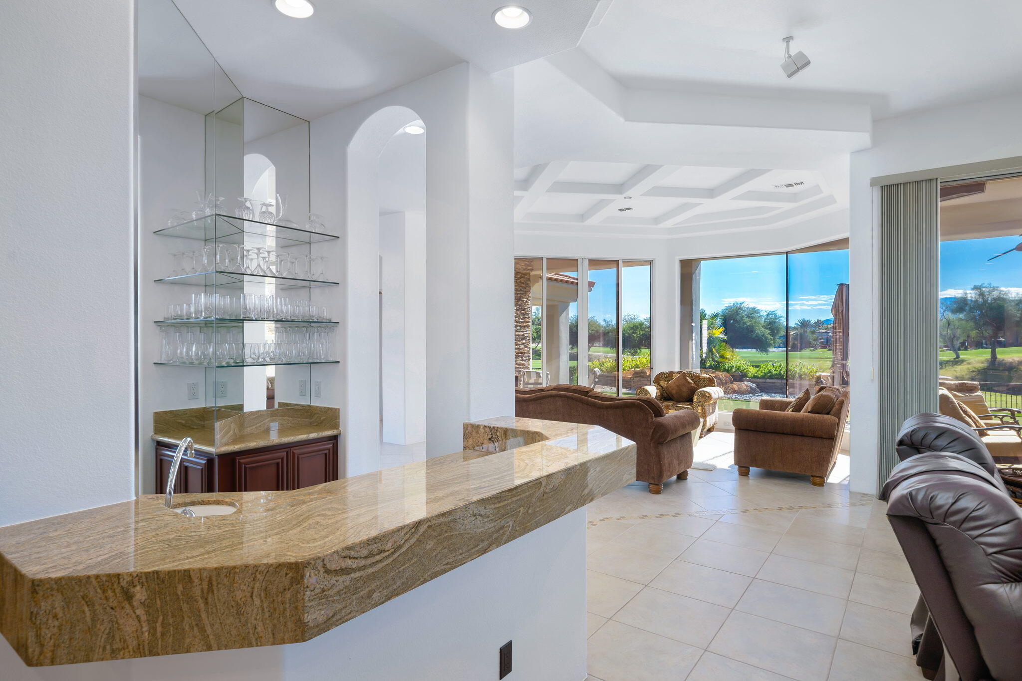 290 Loch Lomond Road Rancho Mirage, CA 92270 - Photo 22 of 50 a living room with furniture and large windows