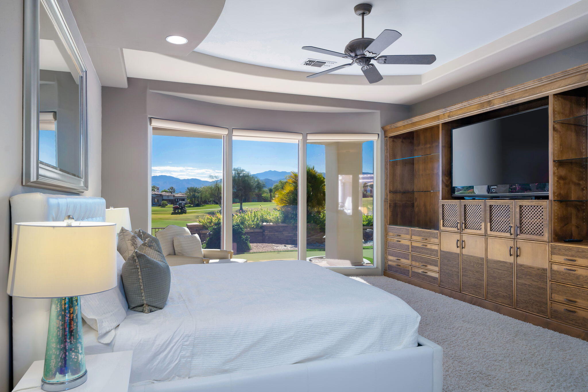 290 Loch Lomond Road Rancho Mirage, CA 92270 - Photo 24 of 50 a bedroom with a bed and large window