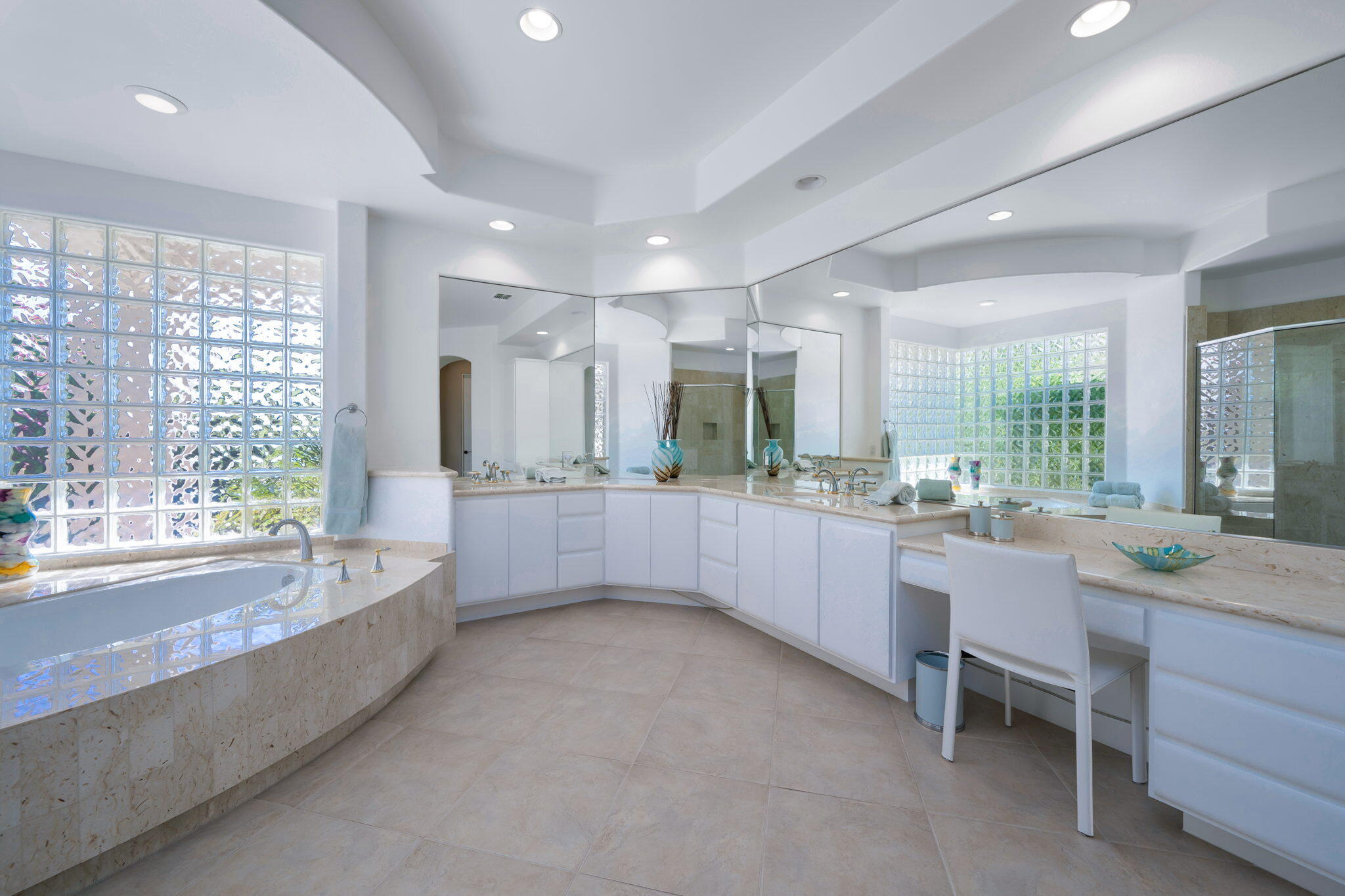 290 Loch Lomond Road Rancho Mirage, CA 92270 - Photo 27 of 50 a large white bathroom with a large tub and sink