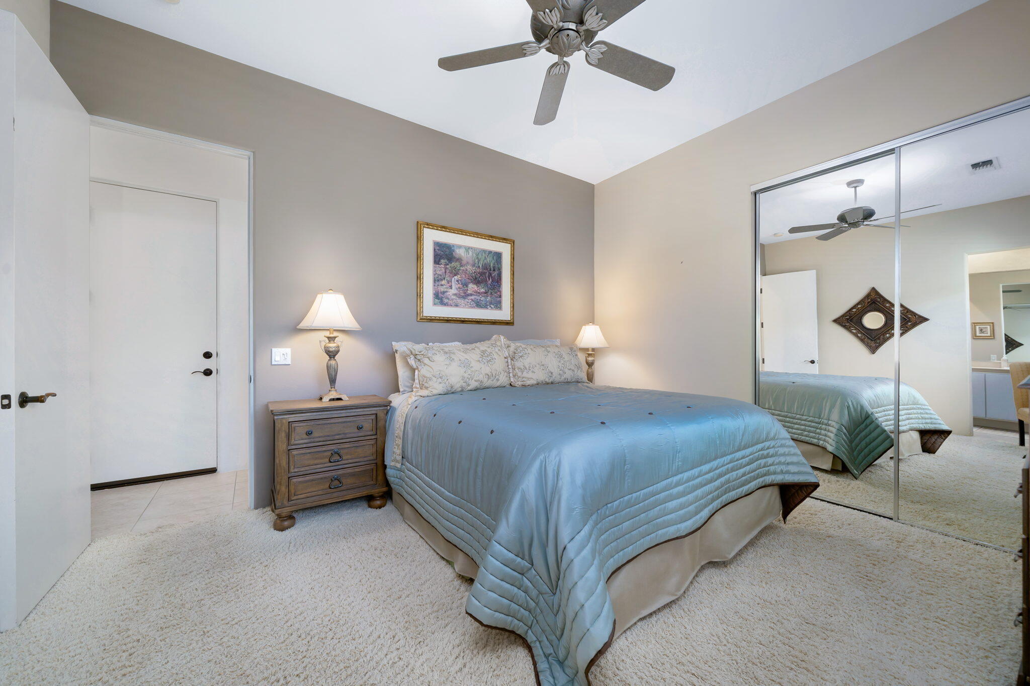290 Loch Lomond Road Rancho Mirage, CA 92270 - Photo 28 of 50 a bedroom with bed and window