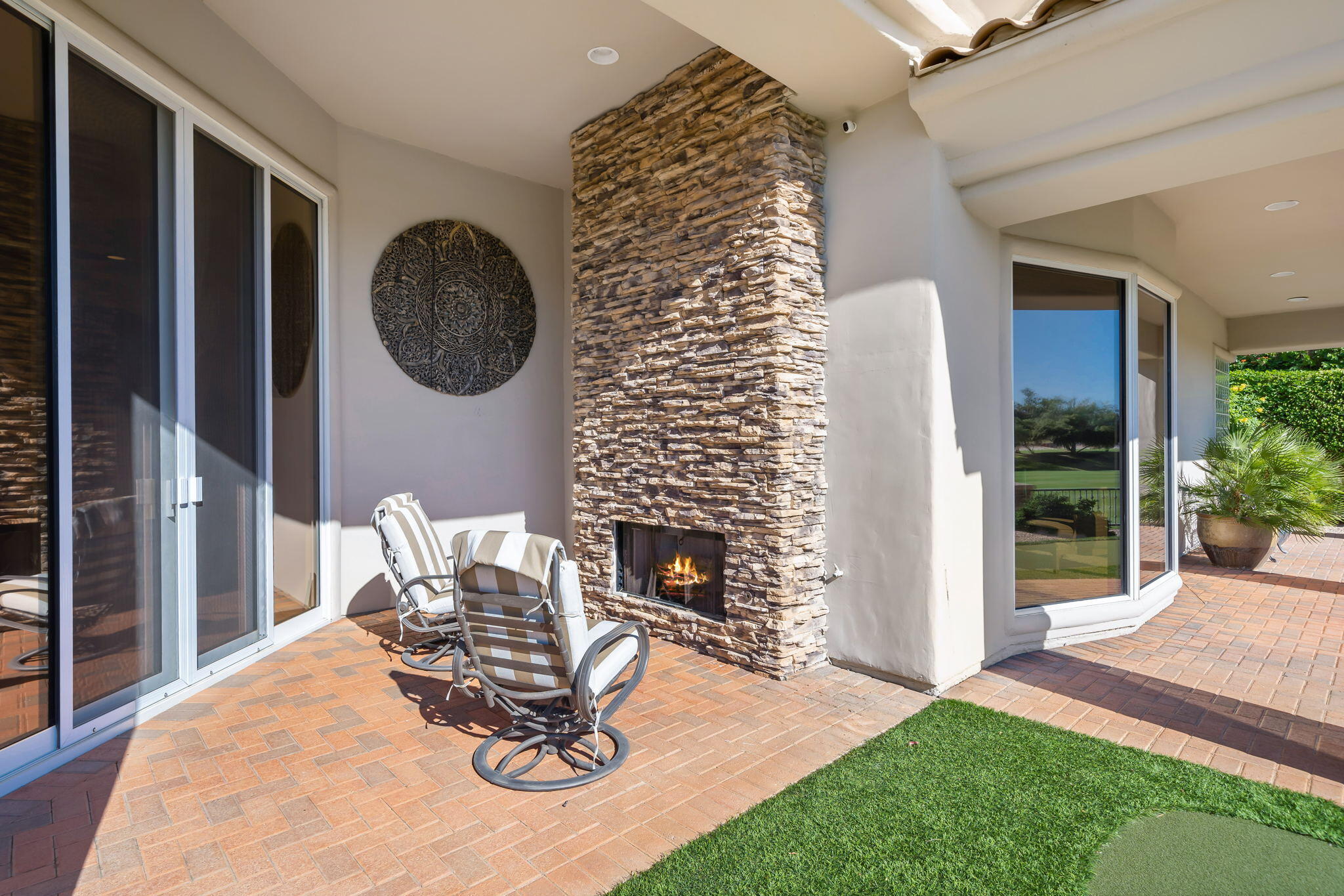 290 Loch Lomond Road Rancho Mirage, CA 92270 - Photo 44 of 50 a table and chairs in the patio