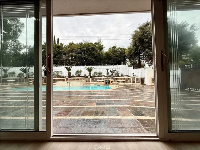 a view of a backyard of a house