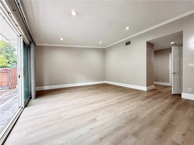 a view of garage with wooden wall