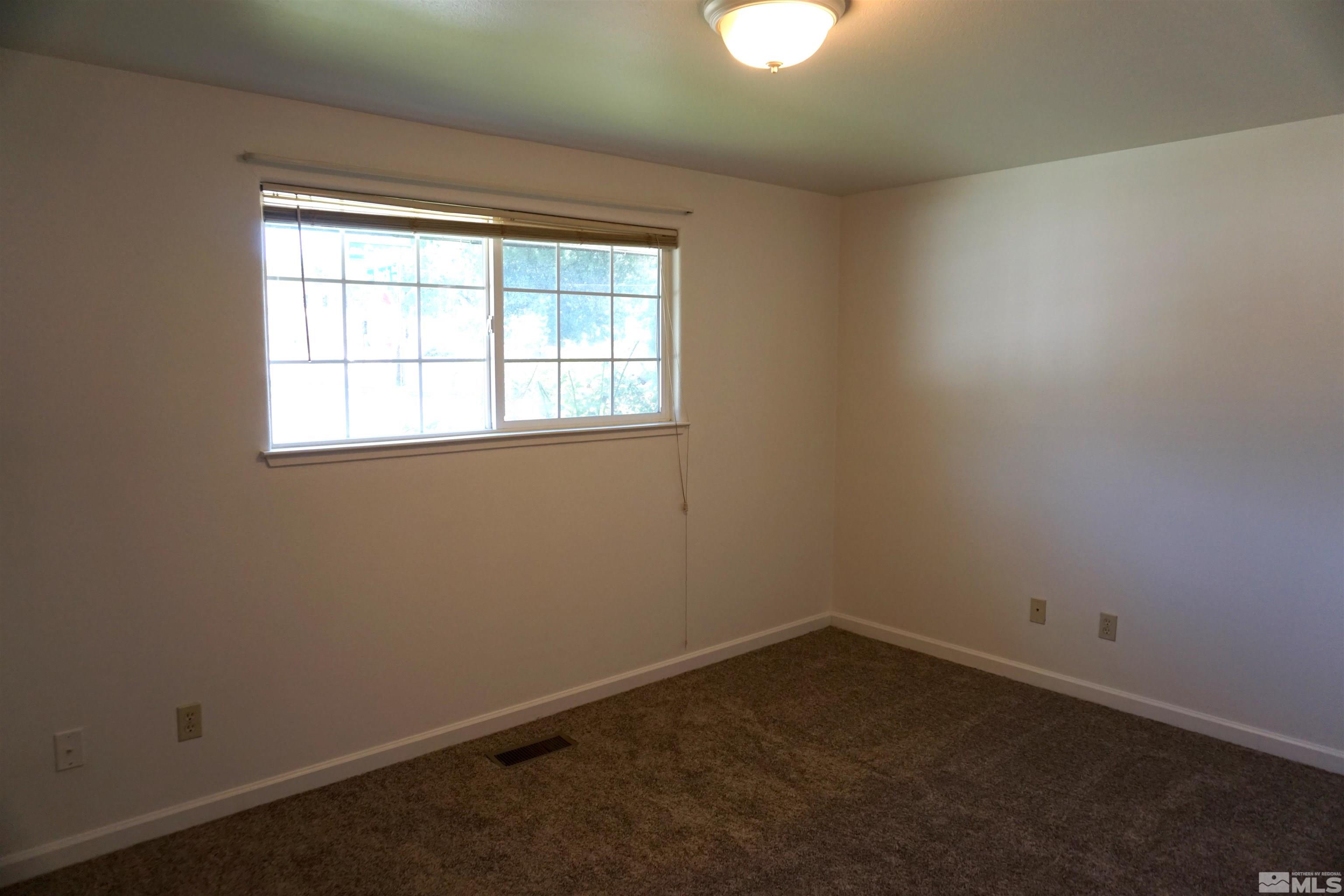 1501 Gault Way Sparks, NV 89431 - Photo 11 of 17 an empty room with a window