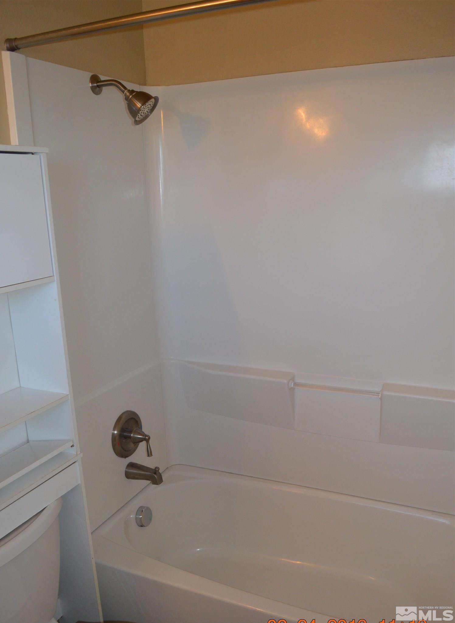 1501 Gault Way Sparks, NV 89431 - Photo 13 of 17 a close up of a bathtub