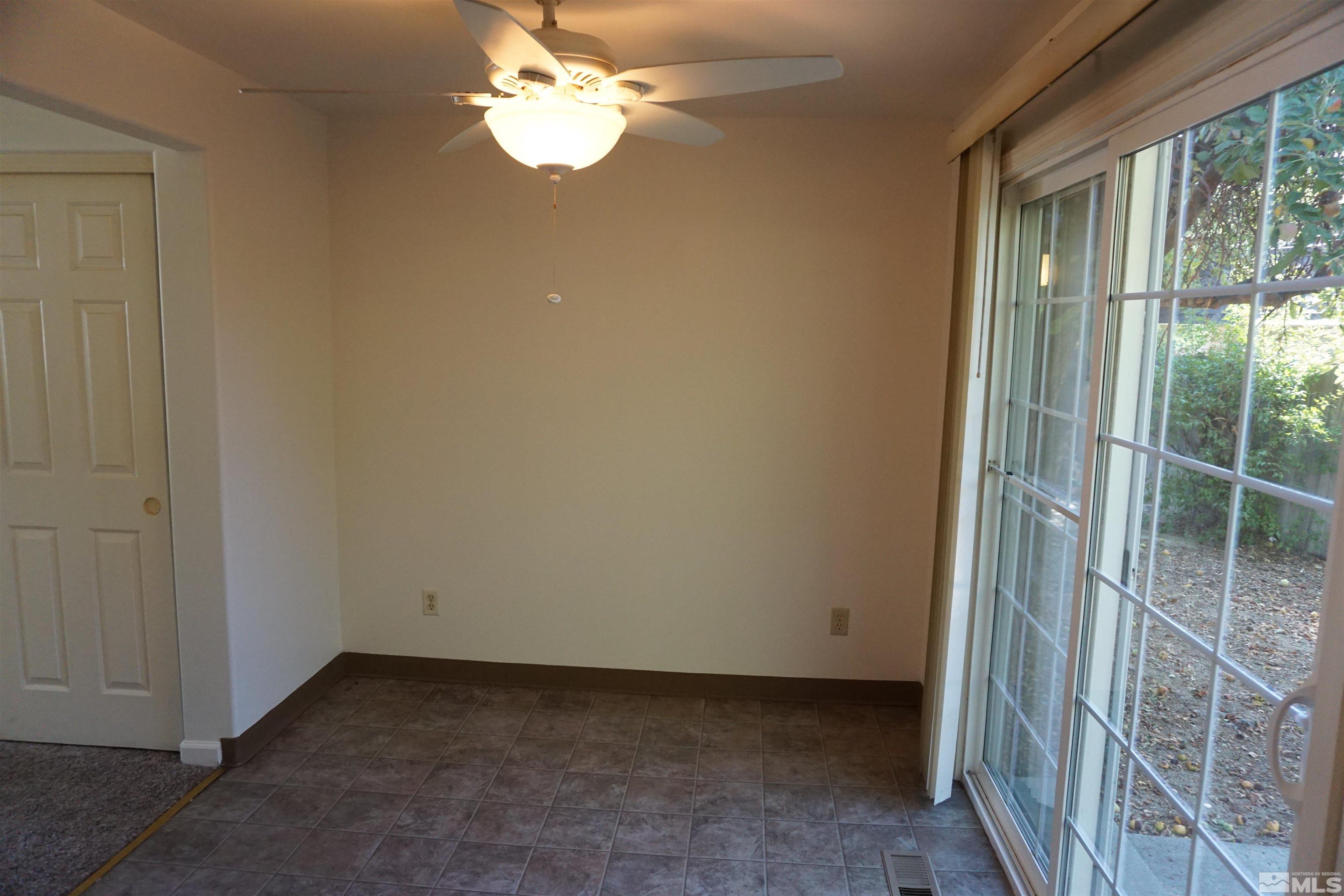 1501 Gault Way Sparks, NV 89431 - Photo 6 of 17 en empty room with windows