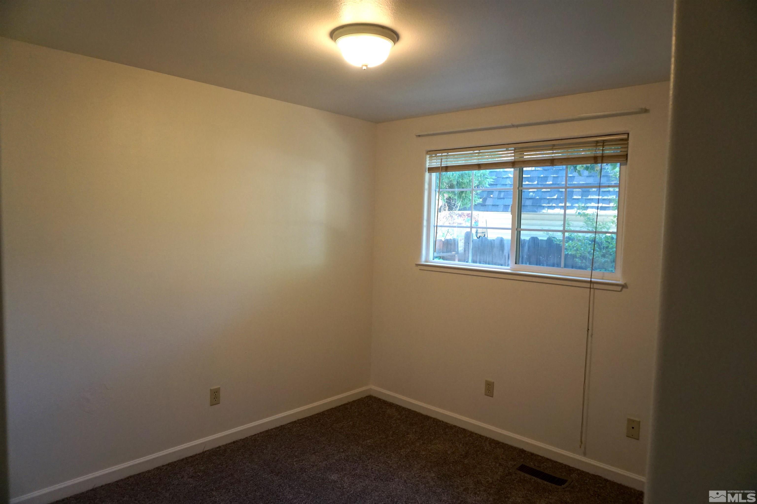 1501 Gault Way Sparks, NV 89431 - Photo 8 of 17 an empty room with a window