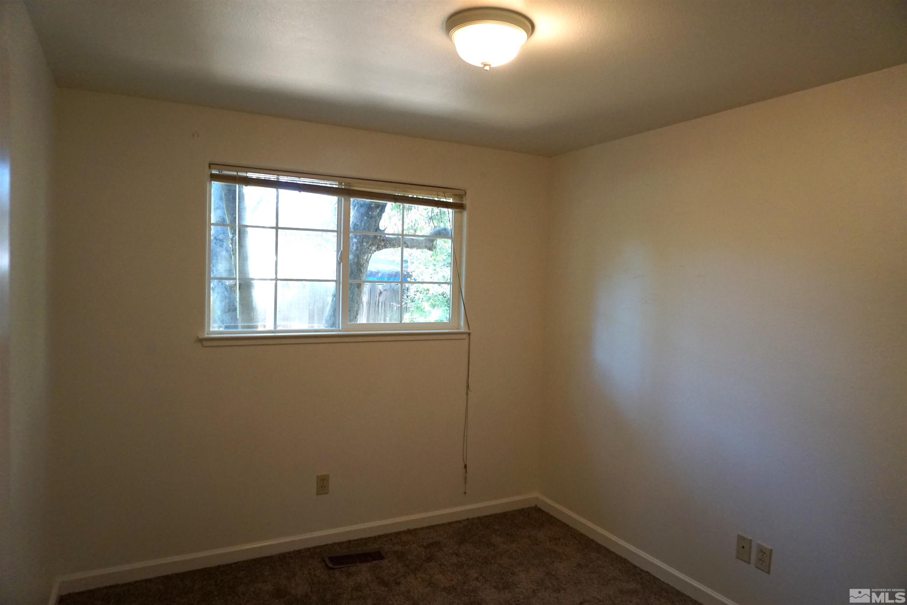 1501 Gault Way Sparks, NV 89431 - Photo 10 of 17 an empty room with a window