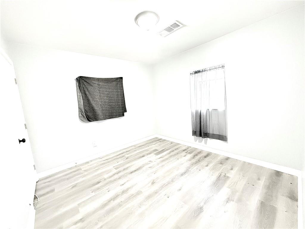 917 Garibaldi Street Southwest Atlanta, GA 30310 - Photo 7 of 9 a view of a room has a bed