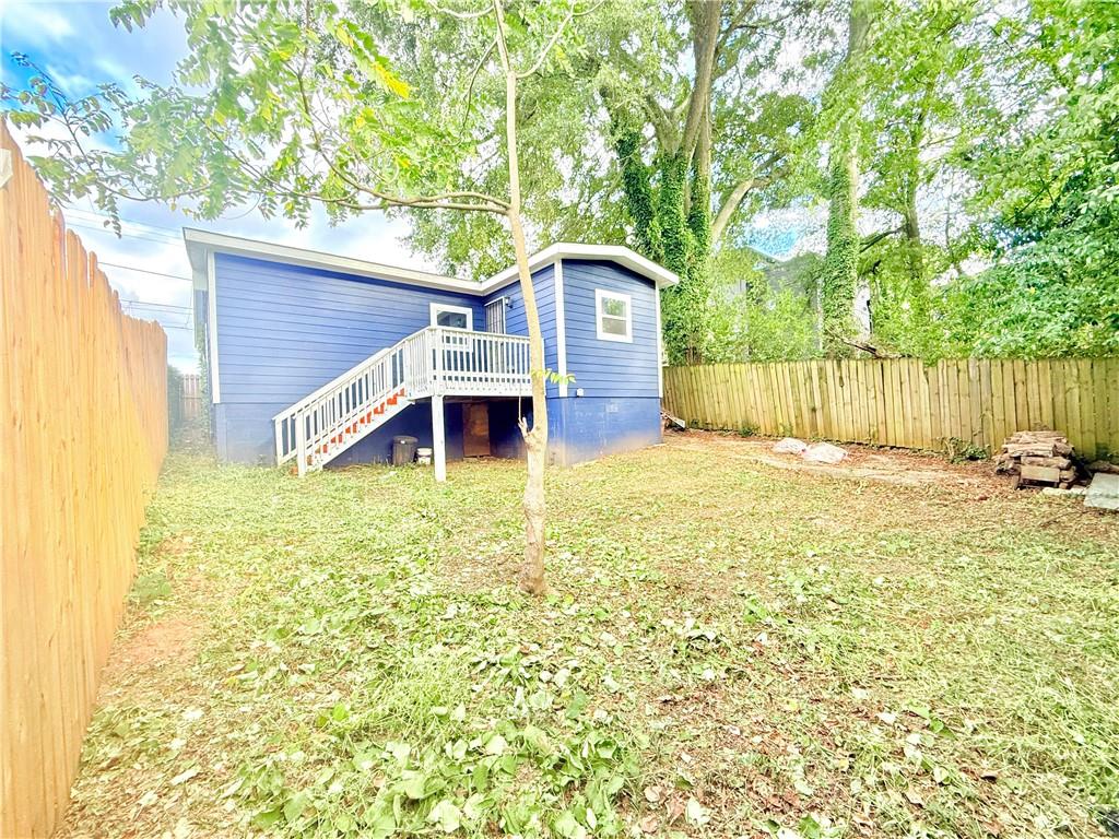 917 Garibaldi Street Southwest Atlanta, GA 30310 - Photo 8 of 9 a view of a backyard with a small cabin