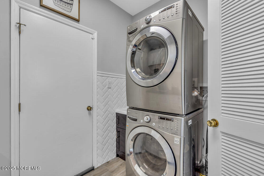 57 Gristmill Road Howell, NJ 07731 - Photo 13 of 80 a close up view of a washer and dryer
