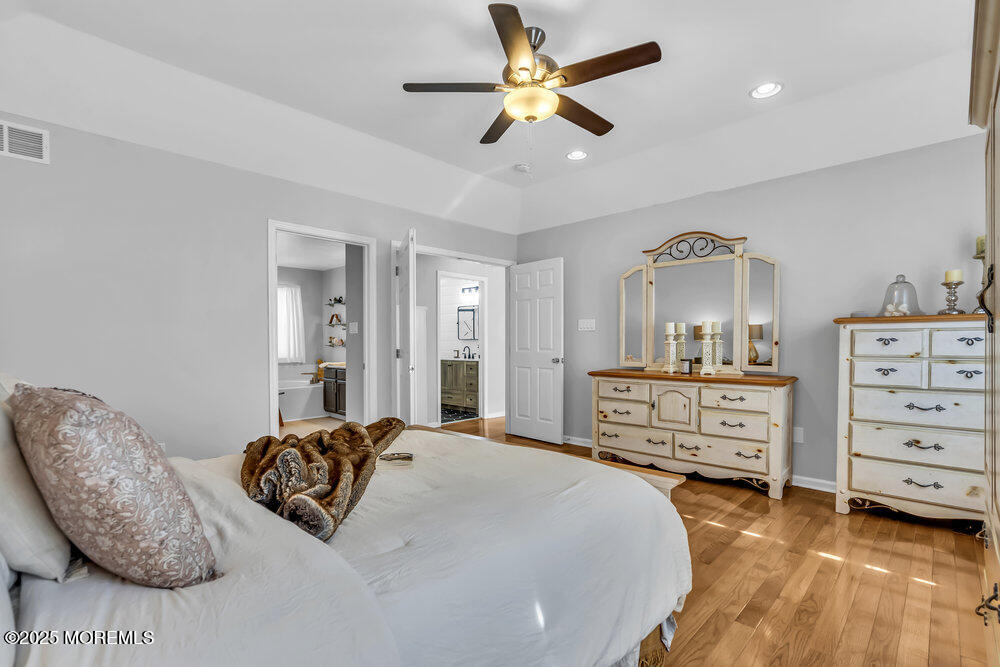 57 Gristmill Road Howell, NJ 07731 - Photo 59 of 80 a bedroom with a bed and a dresser