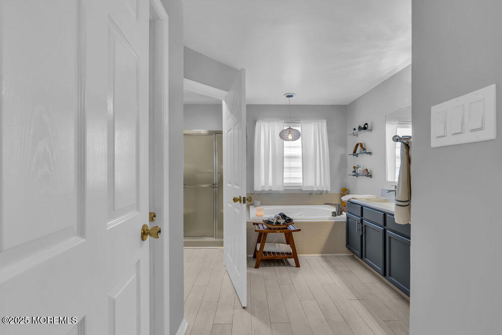 57 Gristmill Road Howell, NJ 07731 - Photo 60 of 80 a kitchen with stainless steel appliances a sink and cabinets