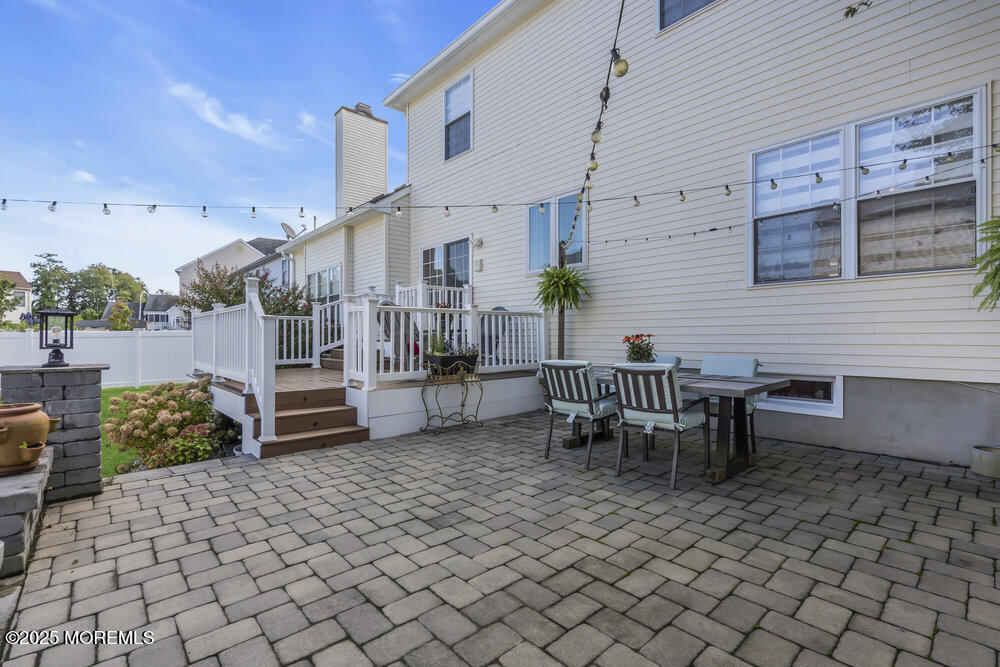 57 Gristmill Road Howell, NJ 07731 - Photo 76 of 80 Paver Patio off the Deck