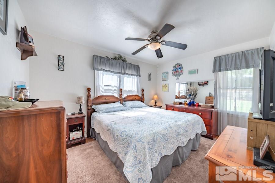 817 Gear Street Reno, NV 89503 - Photo 12 of 21 a bedroom with a bed and wooden floor