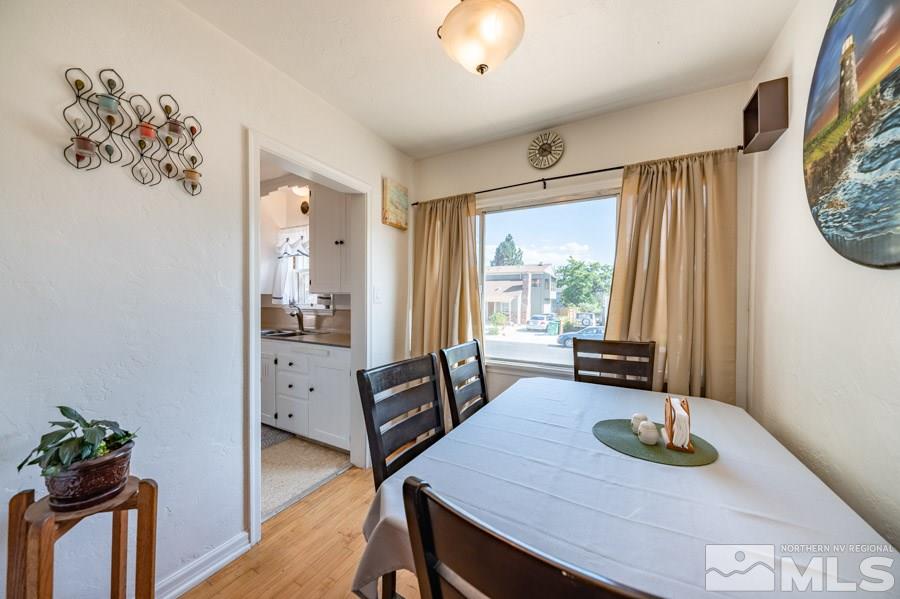 817 Gear Street Reno, NV 89503 - Photo 7 of 21 a view of a dining room with furniture and a window